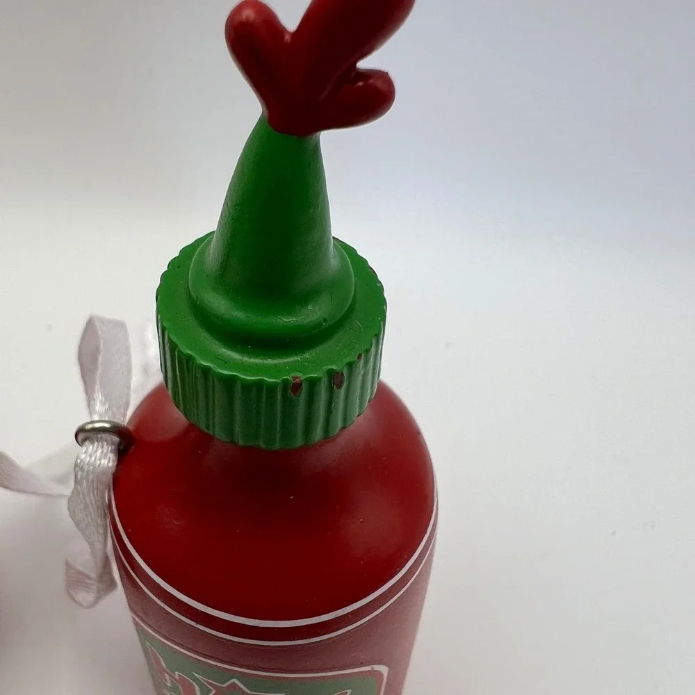 Hallmark Hot Stuff Hot Sauce Christmas Ornament Lot of 2